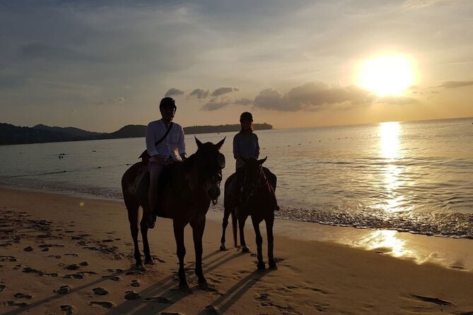 Beach Horse Riding At Sunset In Phuket - Following the shoreline toward sunset