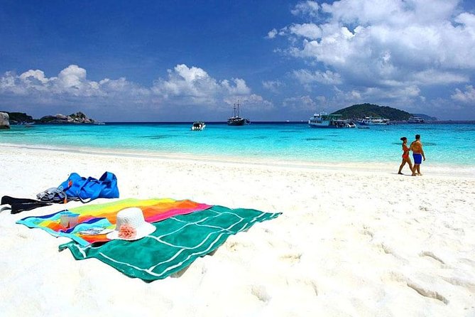 Coral Island Snorkeling Tour By Speedboat From Phuket - Coral Island: sand, swimming, and a quieter cove