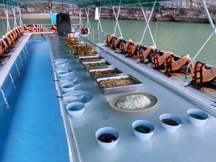From Phuket: Phang Nga Bay and Canoeing Tour by Big Boat - Panak Island: caves and limestone walls
