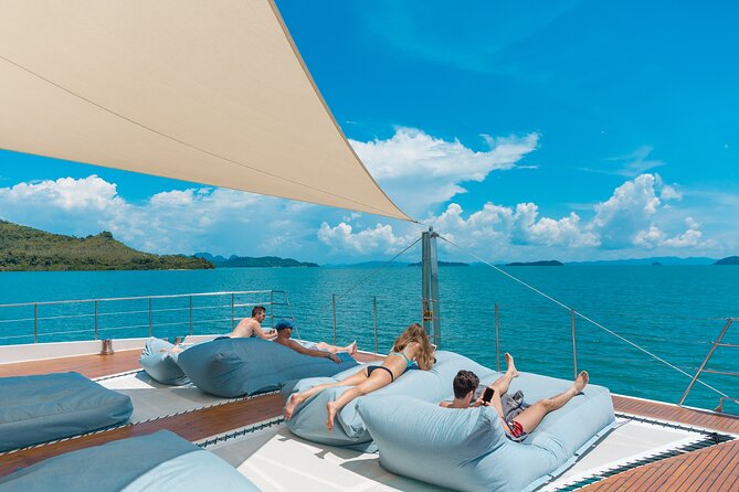 Luxury Boat to James Bond Islands with Lunch and Sunset Dinner - Lawa Island: swimming beside the boat