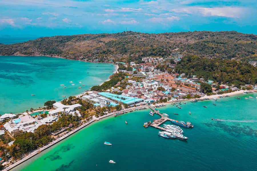 Phi Phi Island Highlights: Cruise, Snorkel & Buffet Lunch - Hotel pickup and the ride to the pier