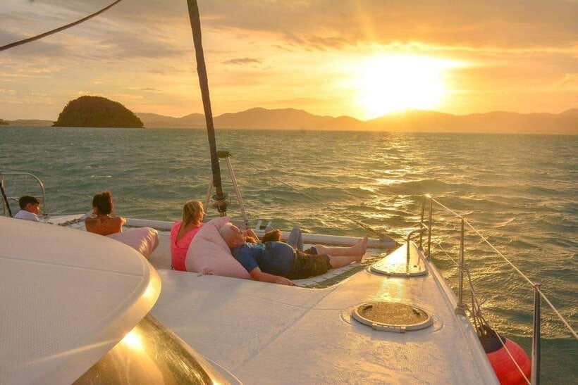 Phuket: Coral Yacht Boat Tour to Coral Island with Sunset - From hotel pickup to the pier