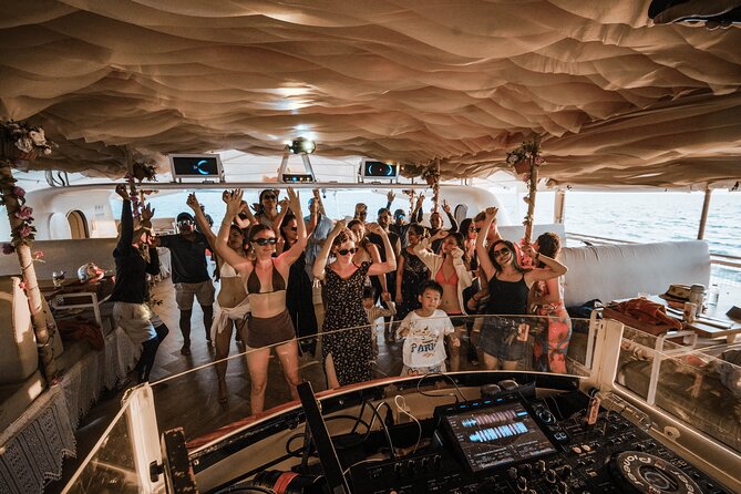 Rhapsody Phuket Coral & Racha Sunset Catamaran Cruise - Lunch, drinks, and what the fare covers